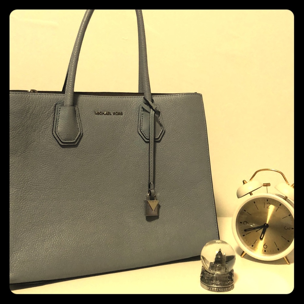 Michael Kors light blue purse.
